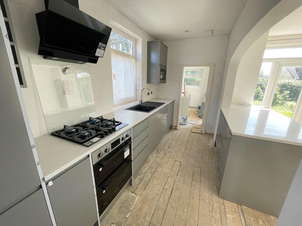 Lot: 52 - HOUSE WITH REFURBISHMENT WORKS ALMOST COMPLETE - Newly fitted kitchen with island